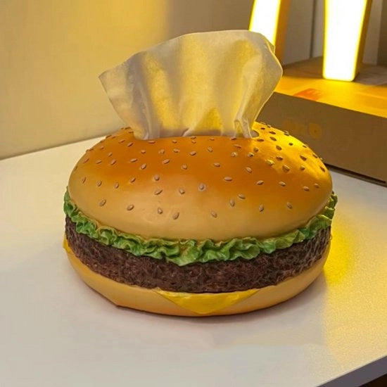 Servizio per tovagliette in forma di hamburger, realizzato in resina leggera.