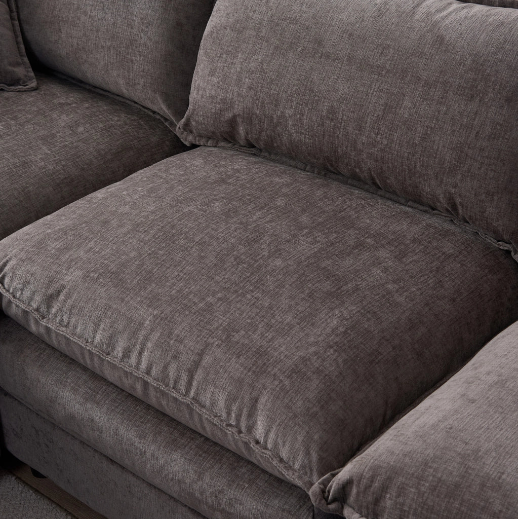 Divano angolare modulare 3 posti in ciniglia grigio con pouf HOMVRA