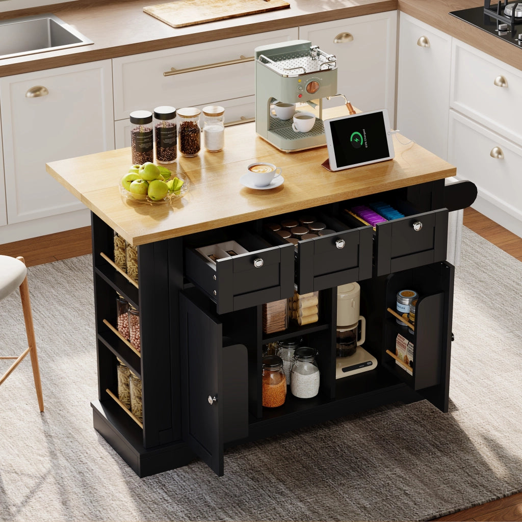 Isola da Cucina Mobile 132x40/70x87 cm Nero e Legno con Piano Ribaltabile; 3 Cassetti; Prese USB e Ruote