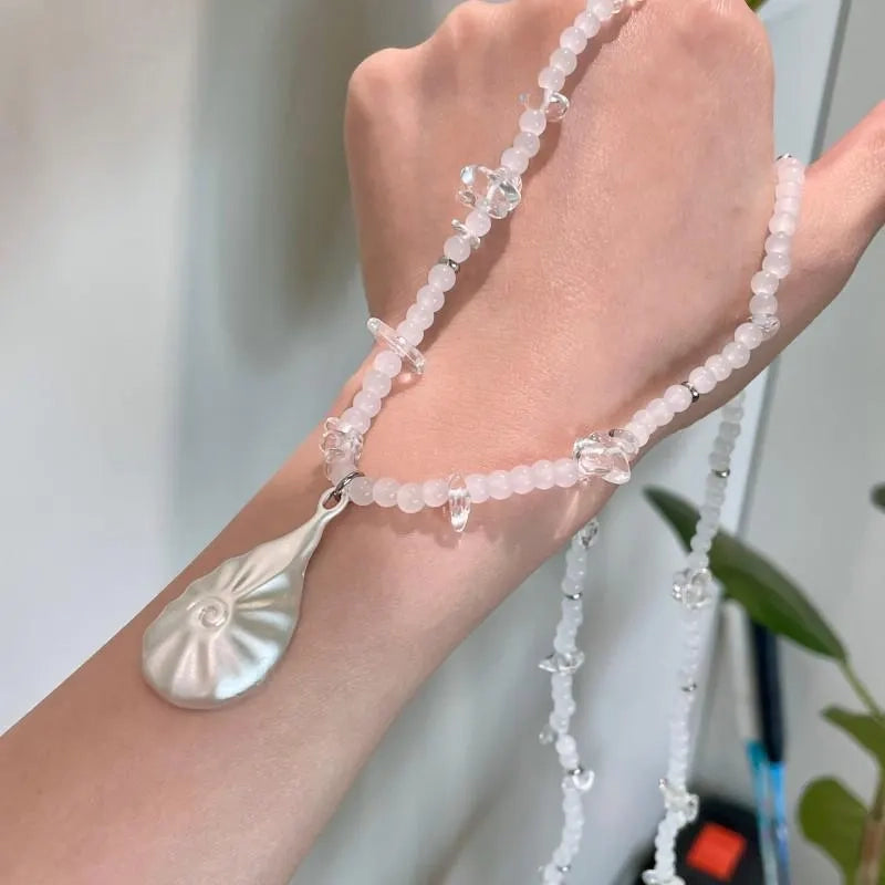 Collana di conchiglie con perline fatta a mano: un regalo vintage con gioielli in cristallo