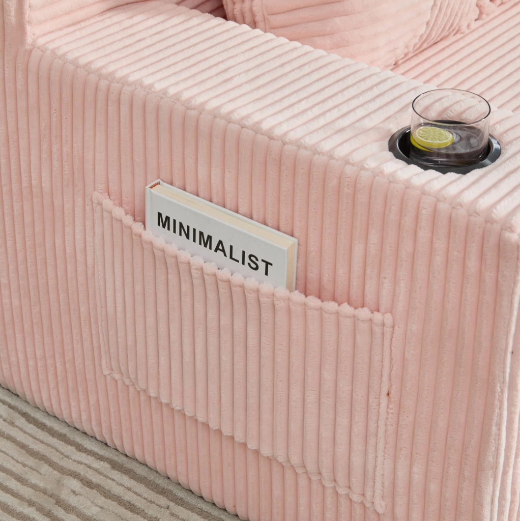 Divano pouf in velluto a coste rosa con tasche laterali e 2 cuscini; 151 × 133 × 64 cm