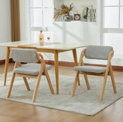 Sedia pieghevole con seduta imbottita in legno grigio