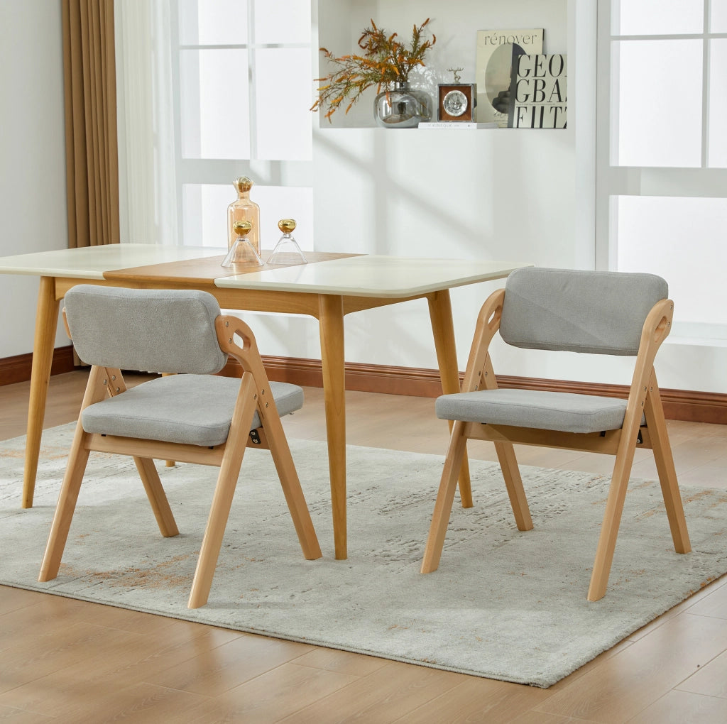 Sedia pieghevole con seduta imbottita in legno grigio