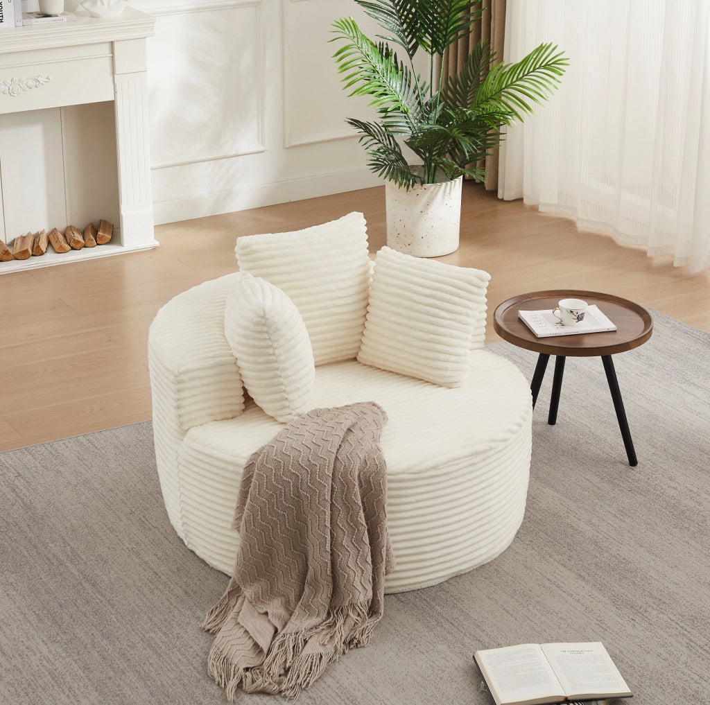 Poltrona relax rotonda in velluto a coste beige con tre cuscini