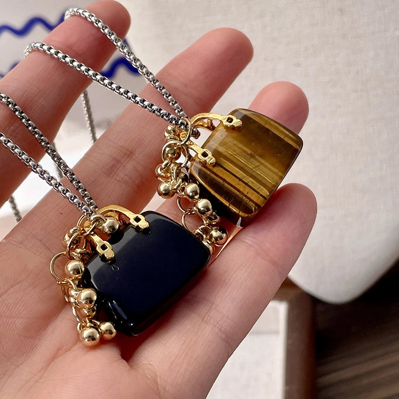 Borsa in ossidiana occhio di tigre naturale, collana con uva