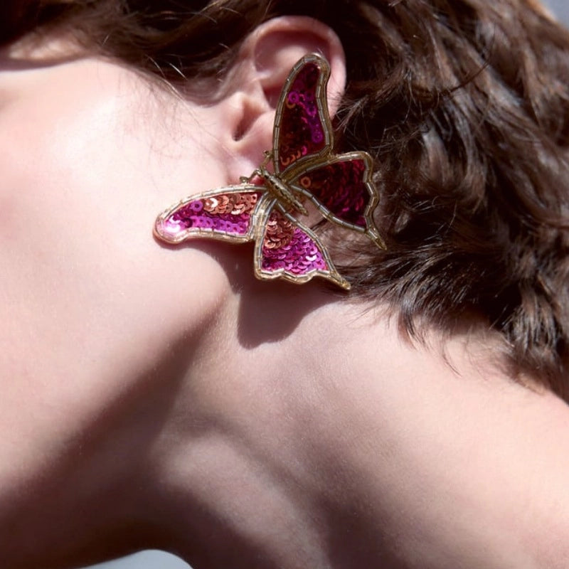 Orecchini a farfalla rosa con perline e paillettes