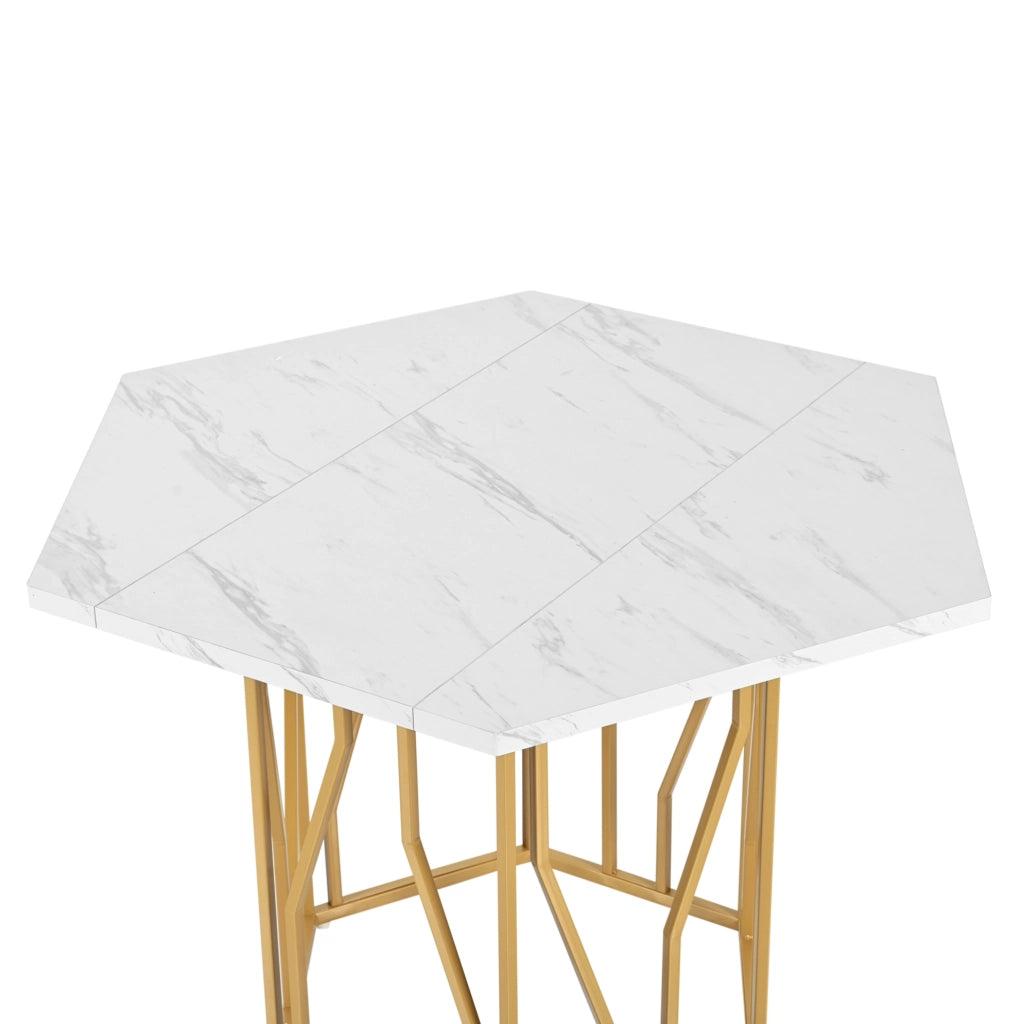 Tavolo da pranzo esagonale con piano effetto marmo in MDF e metallo; dorato e grigio
