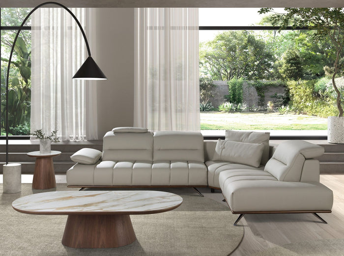 Divano angolare destro in pelle grigio chiaro