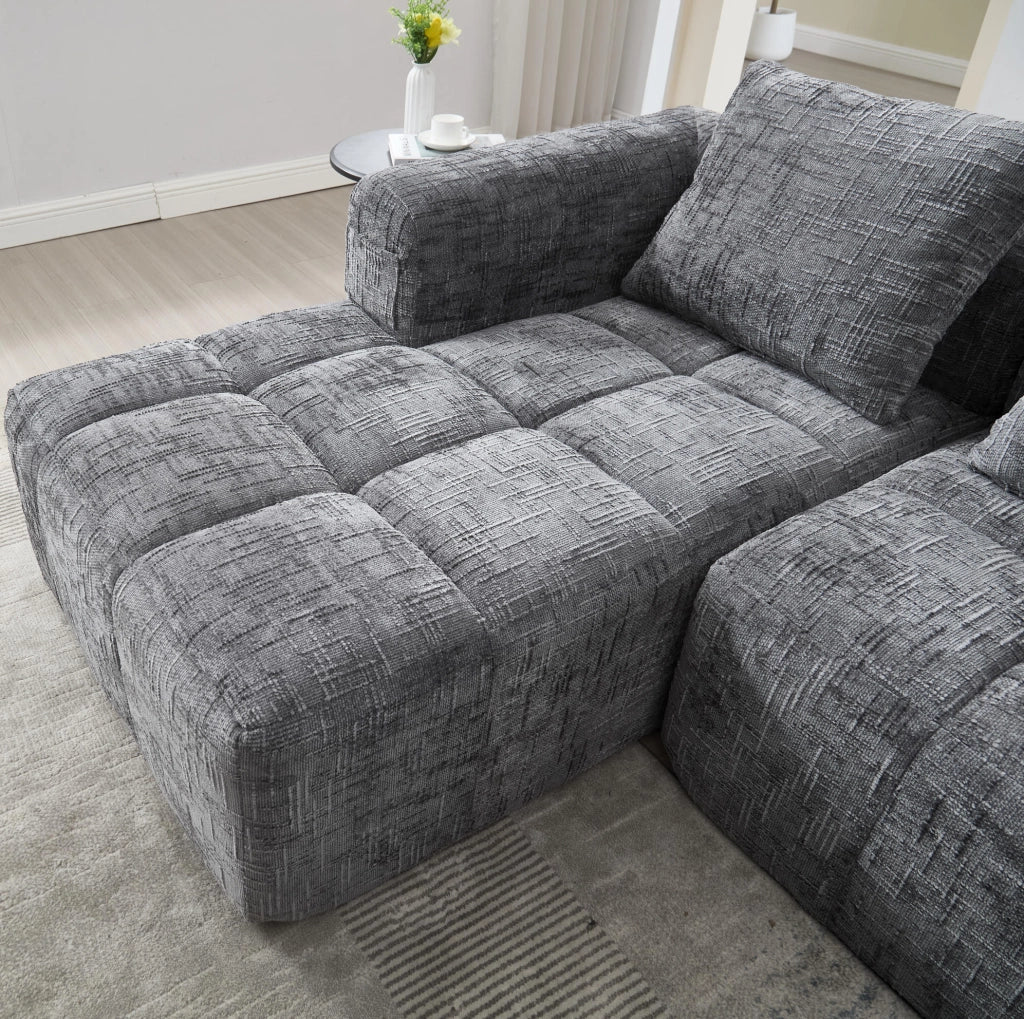 Divano modulare con chaise longue in chenille grigio; 250x158x60 cm; con tasche laterali