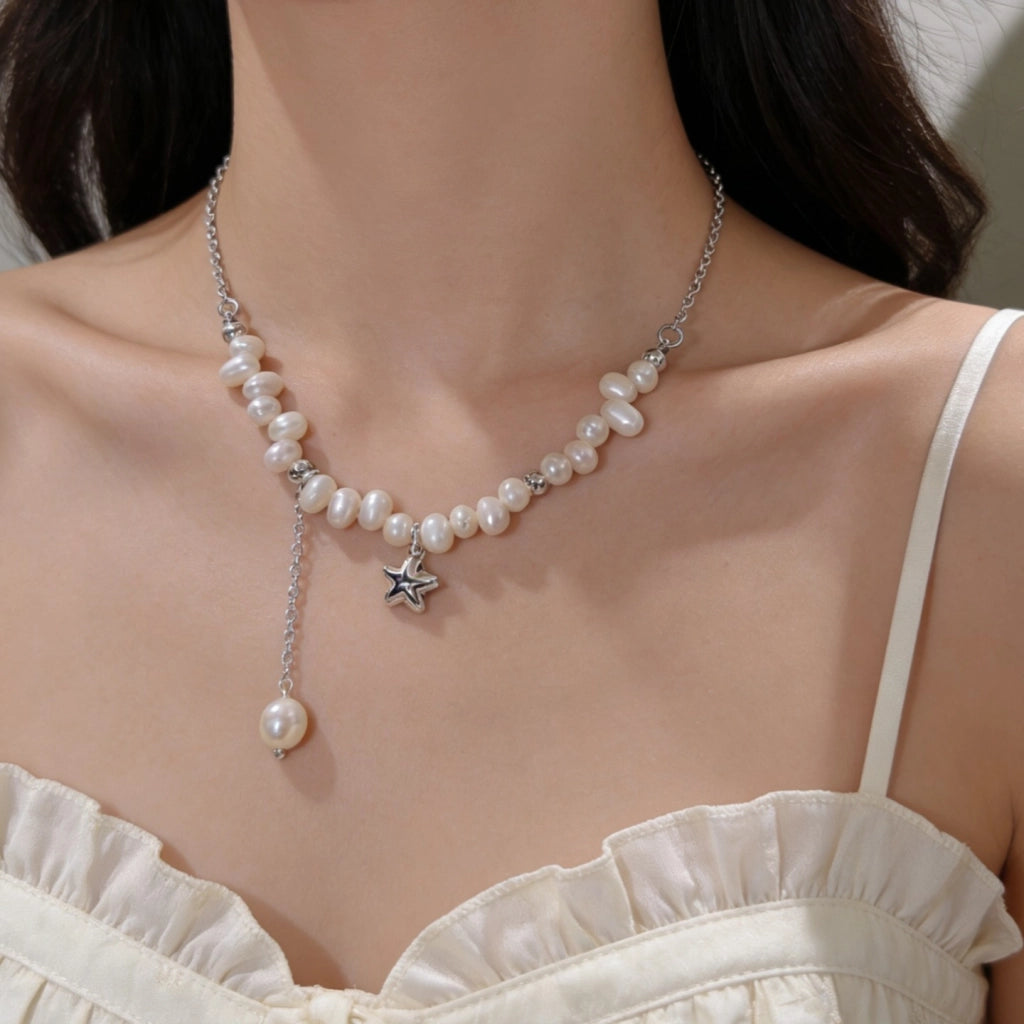 Collana barocca con perle d'acqua dolce naturali e nappe