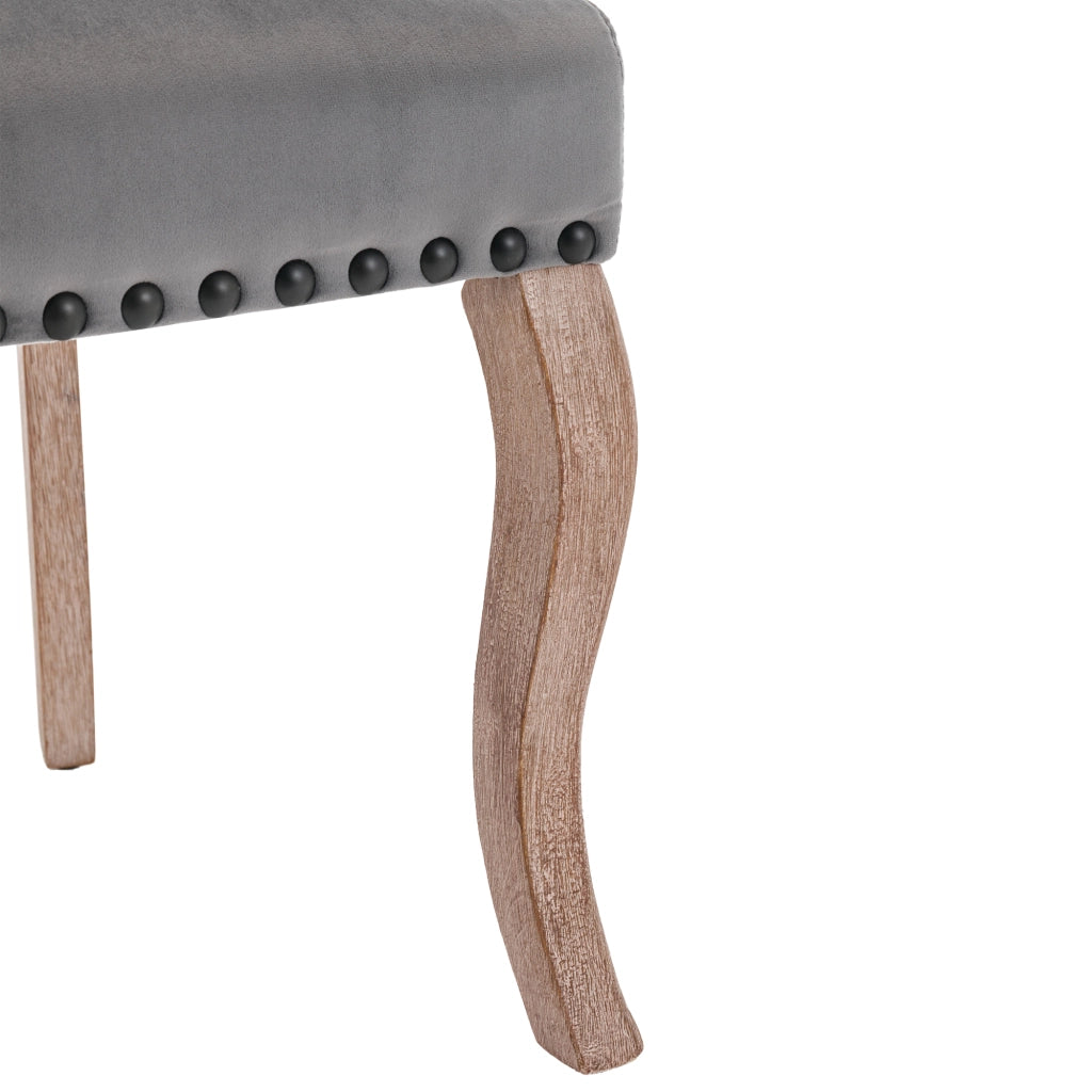 Sedia da pranzo moderna in velluto con schienale decorato e borchie ramate, gambe in legno massiccio grigio