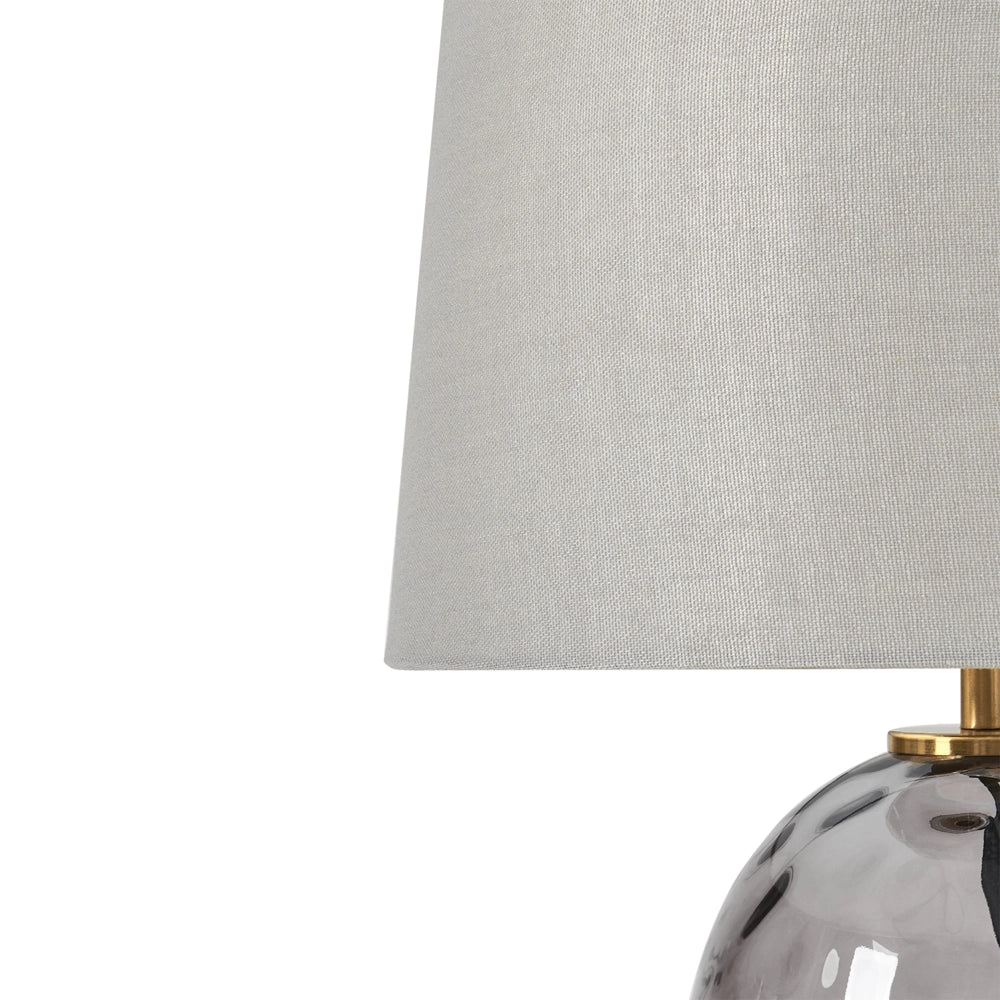 Lampada da tavolo Base in vetro fumé trasparente e grigio Paralume a tamburo in tessuto Design moderno