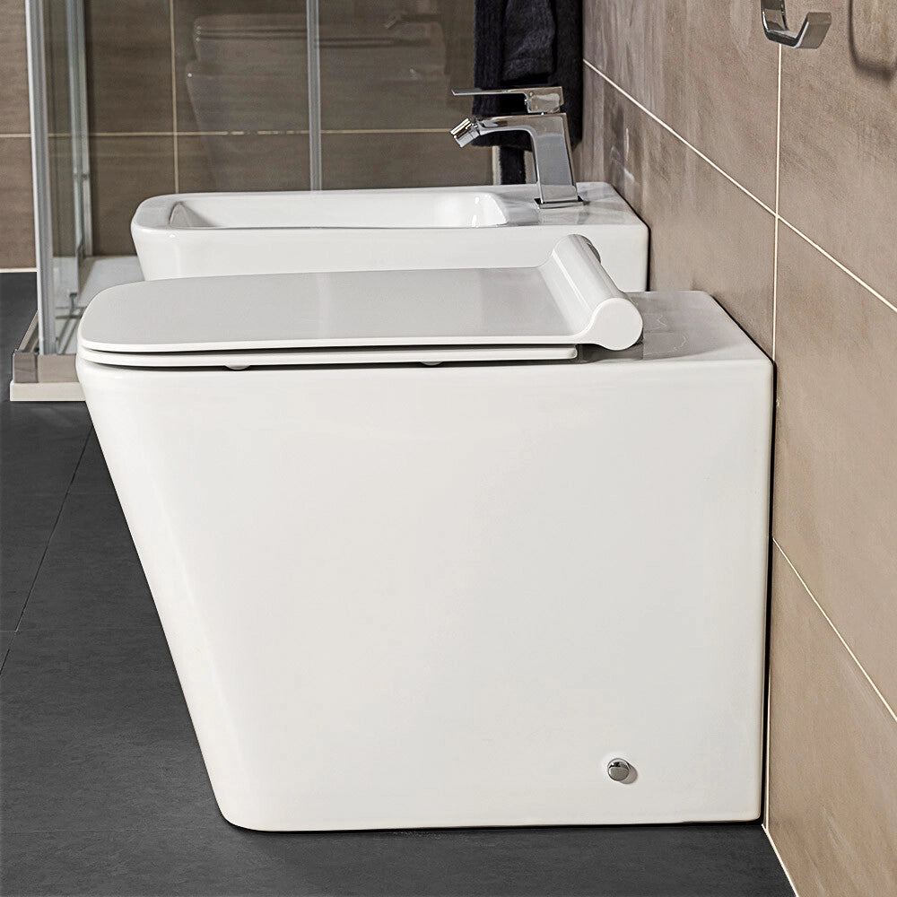 Wc filomuro Rimless serie Malaga in ceramica bianco lucido