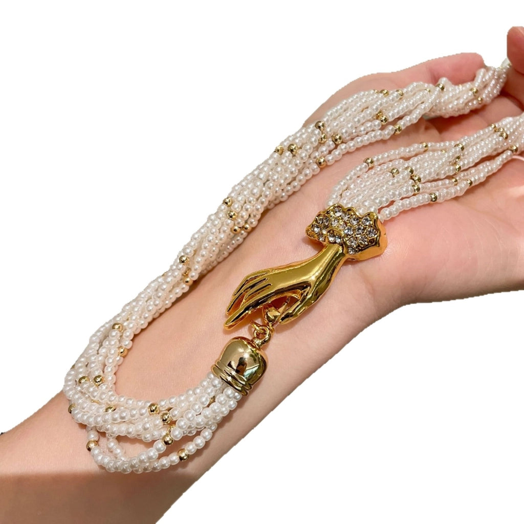 Collana retr¨° a pi¨´ strati con perle in stile Hepburn, elegante bracciale a pi¨´ strati con motivo a palma