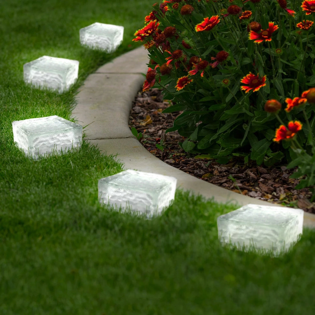 IDMarket - Confezione da 8 pietre solari in vetro con 4 LED bianchi per l'illuminazione del giardino