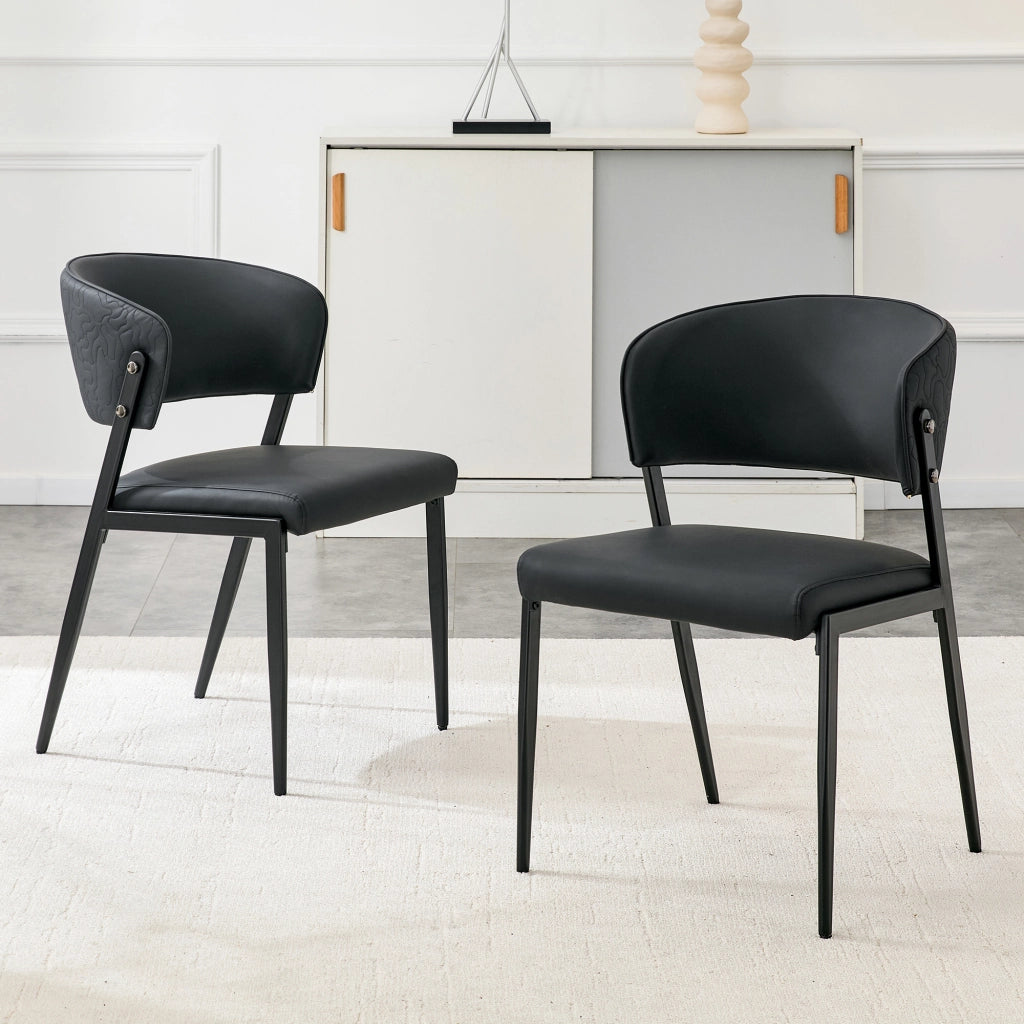 Sedia da pranzo moderna in PU nero con struttura in metallo e schienale ergonomico