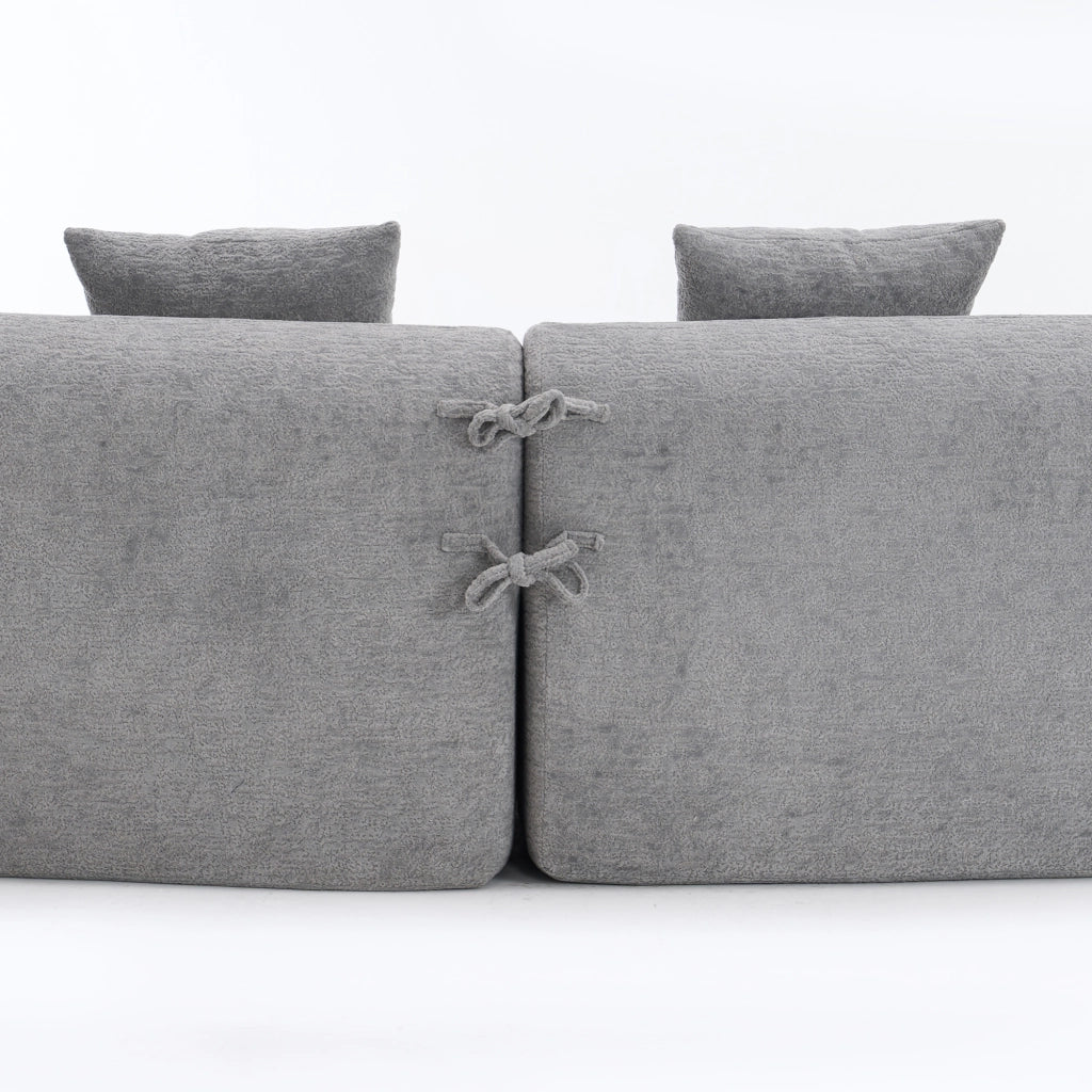Divano angolare a 4 posti modulare in chenille grigio con forma curva per soggiorno e ambienti ampi