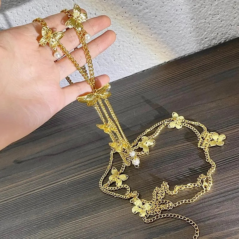 Collana fatta a mano con farfalla, nappa e perle, regalo di Natale o di compleanno.