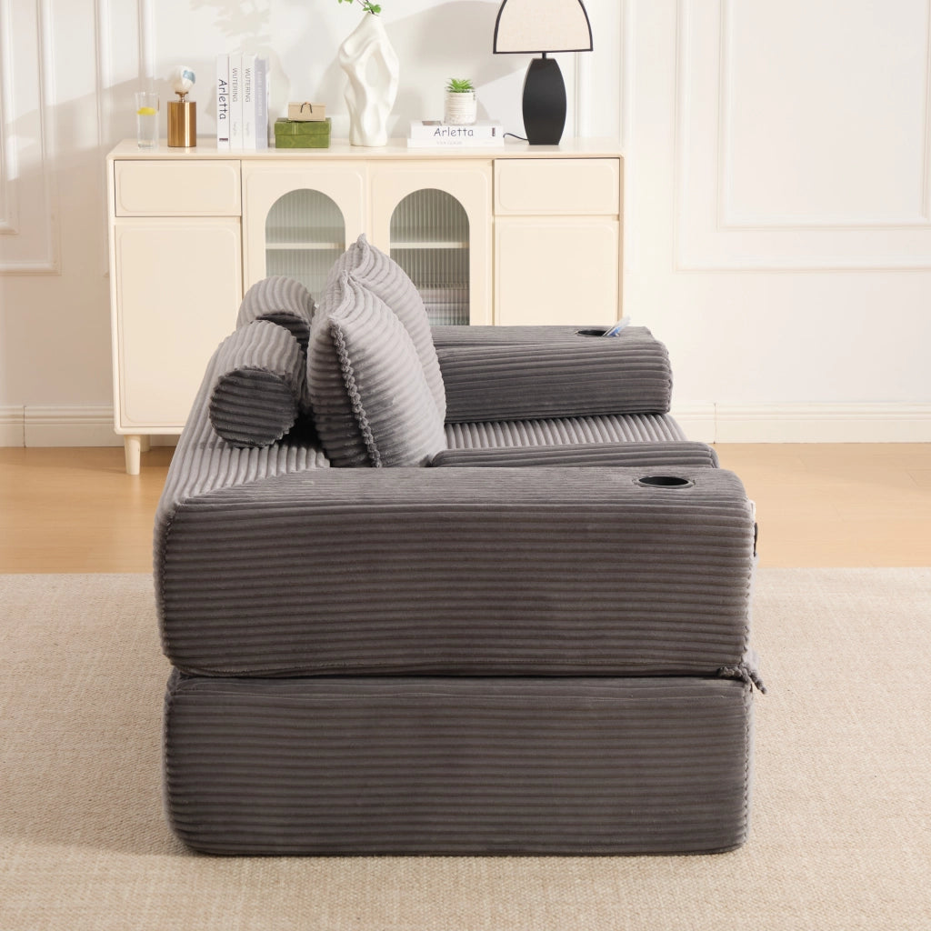 Divano letto modulare in tessuto a coste con tasche laterali, portabicchieri e cuscini memory grigio scuro