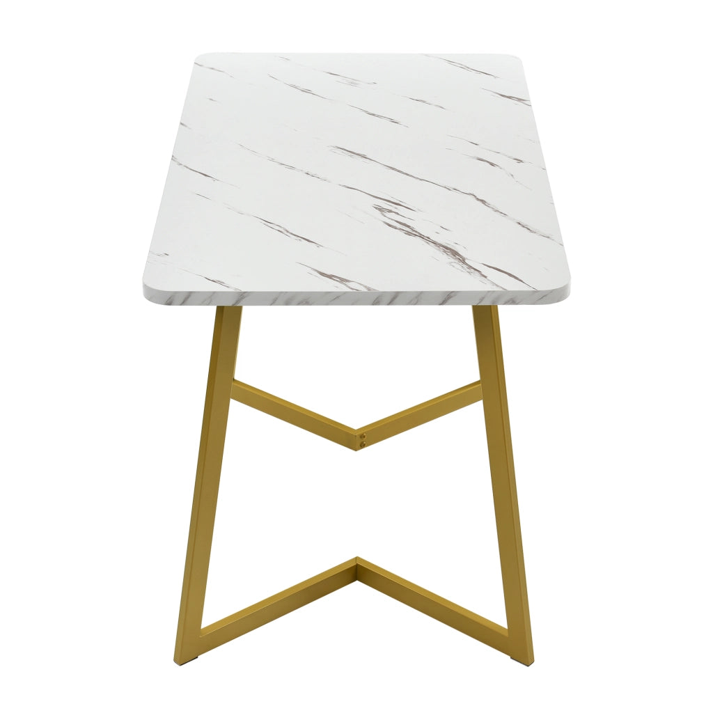 Tavolo da pranzo per 4 persone con piano effetto marmo e gambe in metallo dorato; in MDF; 117 x 68 x 75 cm