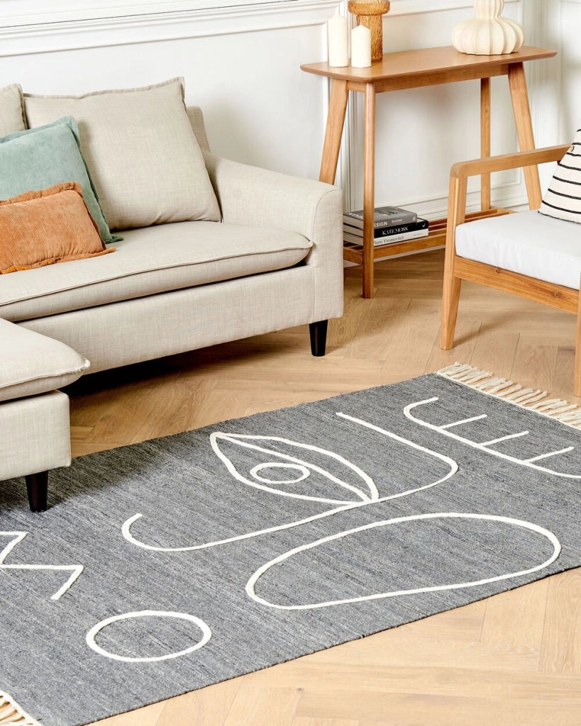Tappeto rettangolare per interni e per esterni in poliestere con motivo a nappe grigio 140 x 200 cm stile boho
