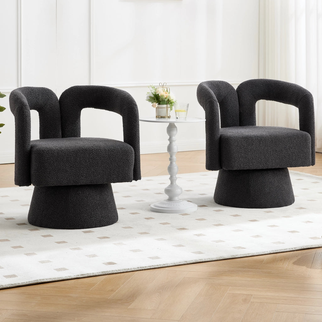 Poltrona girevole 360° in bouclé grigio scuro, con braccioli arrotondati e base in metallo