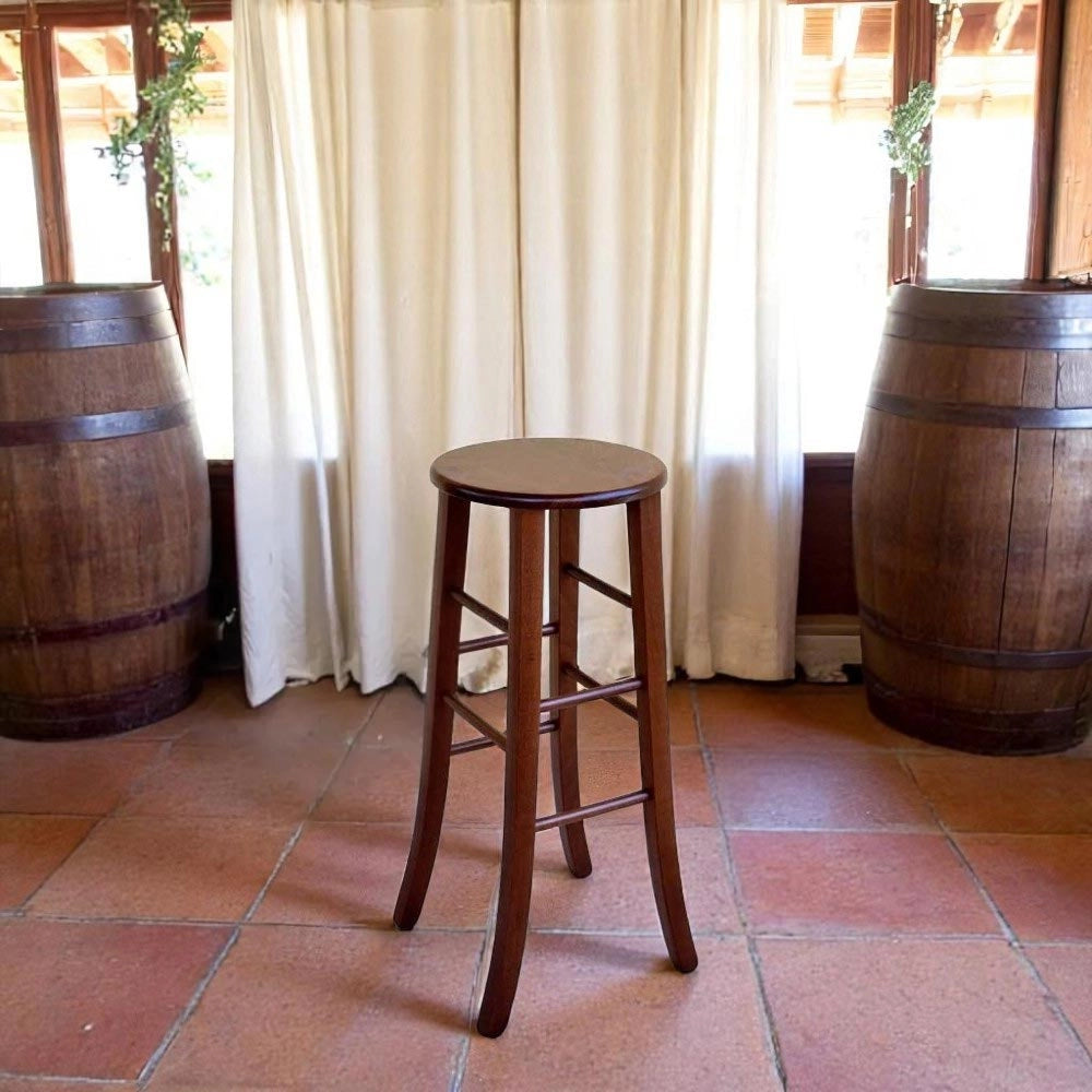 Sgabello in legno massello noce scuro h 80 con seduta tonda e gambe a sciabola