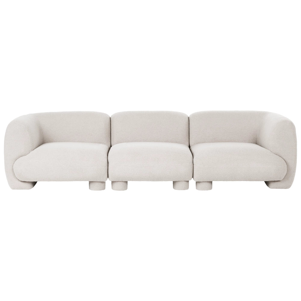 Divano modulare bouclé a tre posti profilo ribassato forma organica bianco sporco