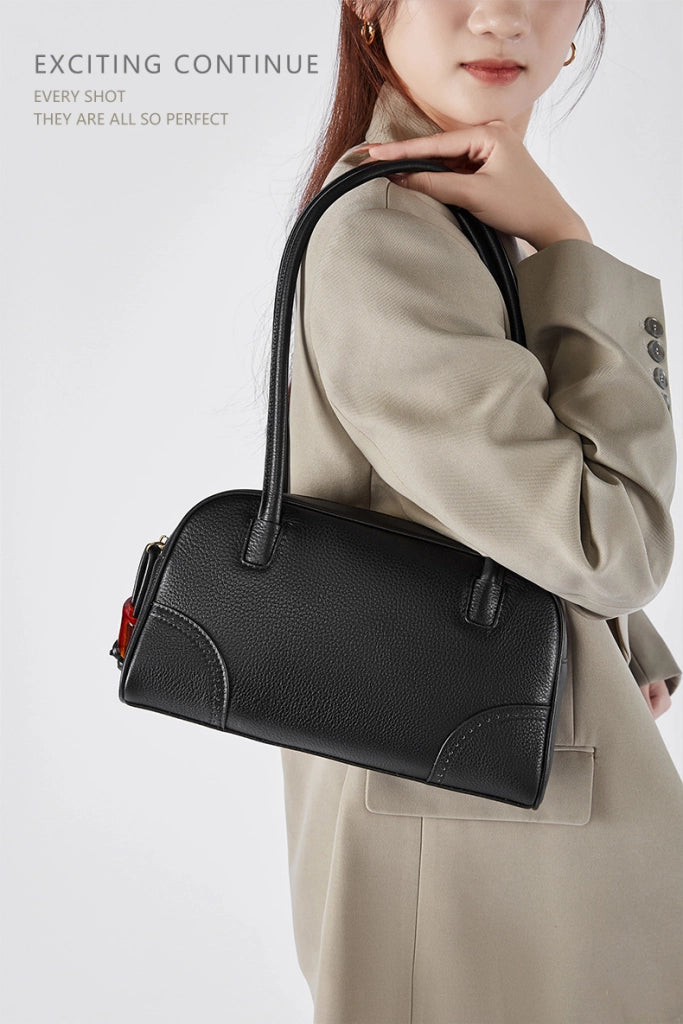 Borsa a tracolla da donna in vera pelle, colore nero.