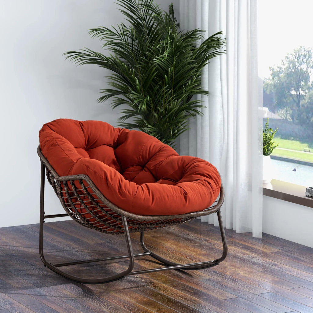 Rocking-chair in rattan sintetico con struttura in acciaio e seduta ergonomica per esterni arancione 78 × 106 × 90 cm