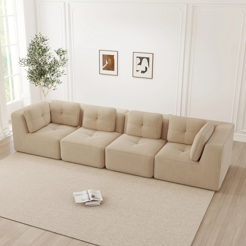 Divano angolare modulare in velluto a coste beige con seduta bassa e braccioli larghi
