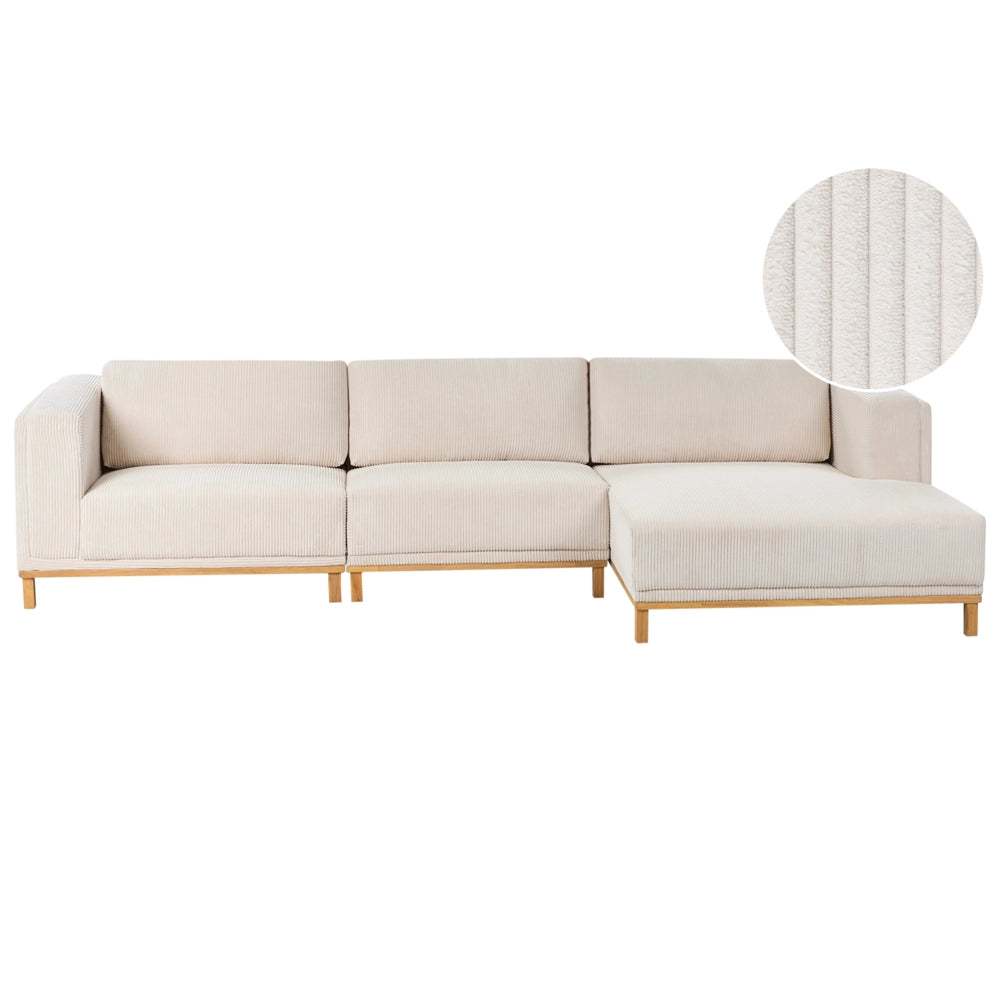 Divano angolare in velluto a 5 posti con braccioli e gambe in legno beige chiaro in stile moderno
