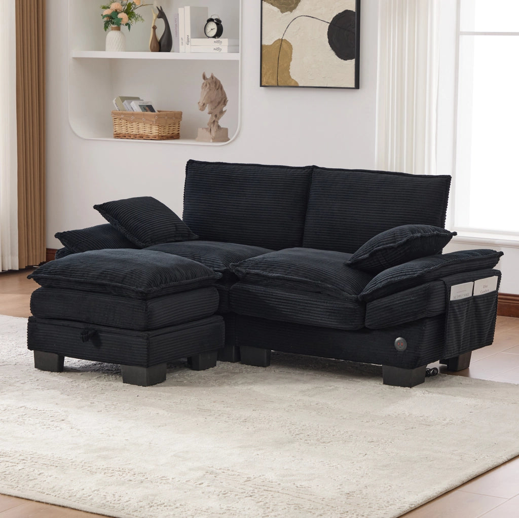 Divano 2 posti con pouf in corduroy nero; USB-C; tasche laterali e vano contenitore 190x132x84 cm