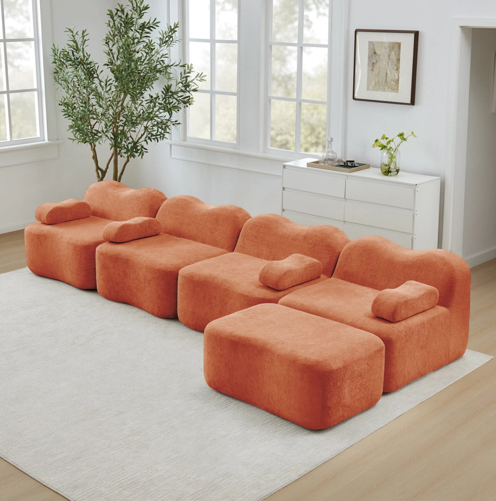 Divano angolare modulare 384x167x70 cm in velluto arancione con pouf collegabile
