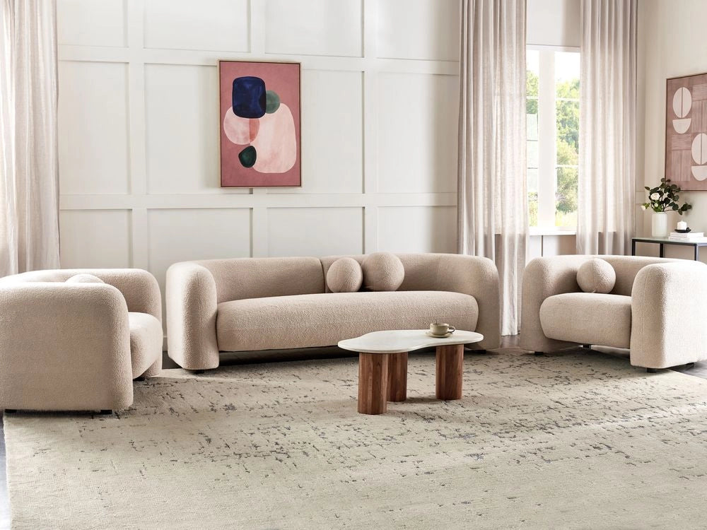 Set da salotto composto da divano a 5 posti e 2 poltrone in tessuto bouclè beige con cuscini aggiuntivi stile glamour retrò soggiorno