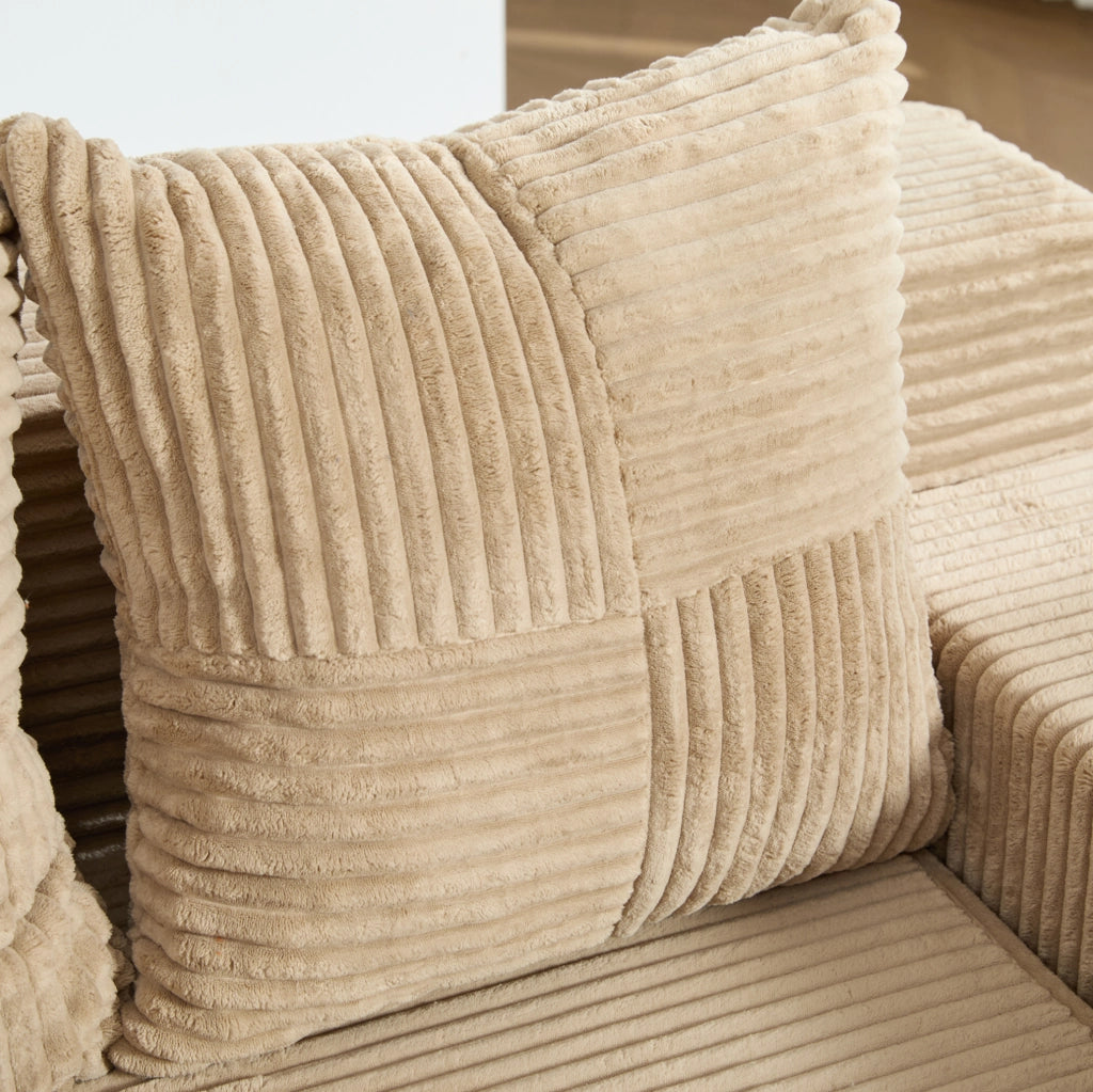 Divano pouf in velluto a coste kaki con tasche laterali e 2 cuscini; 151 x 133 x 64 cm
