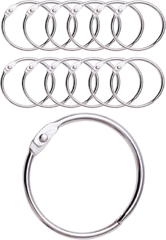 12 Anelli per docciaschermo con ganci metallici, apertura circolare da 50 mm, colore metallic.