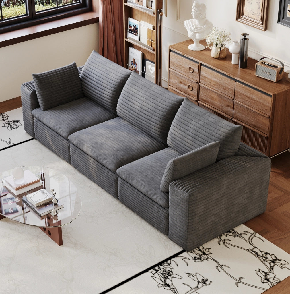 Divano modulare in tessuto grigio scuro con supporto in schiuma e design componibile