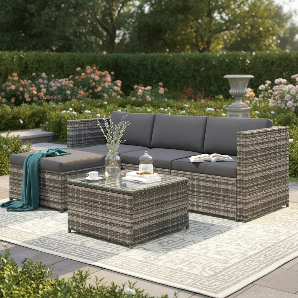 Set divano angolare giardino ¨C Minimal ¨C polyrattan grigio con cuscini e tavolo con piano in vetro