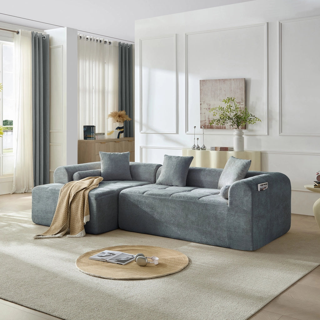 Divano angolare in chenille blu con tasca laterale; imbottitura in schiuma e molle