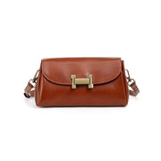 Borsa a tracolla da donna in vera pelle, colore marrone.