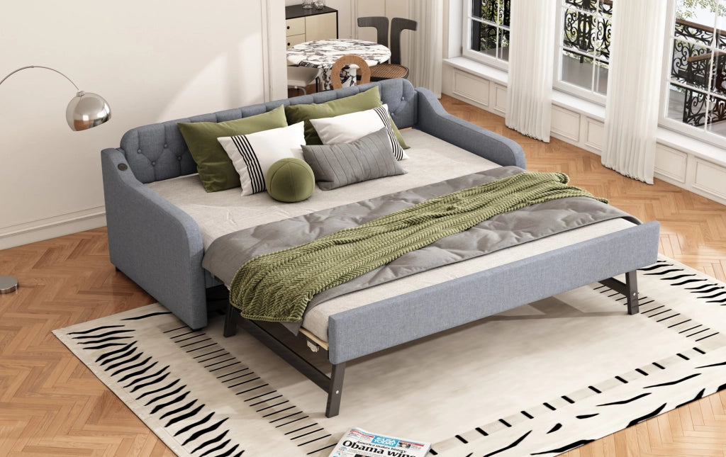 Divano letto grigio 90x200 cm con letto estraibile e porta USB