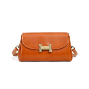 Borsa a tracolla da donna in vera pelle, colore arancione.