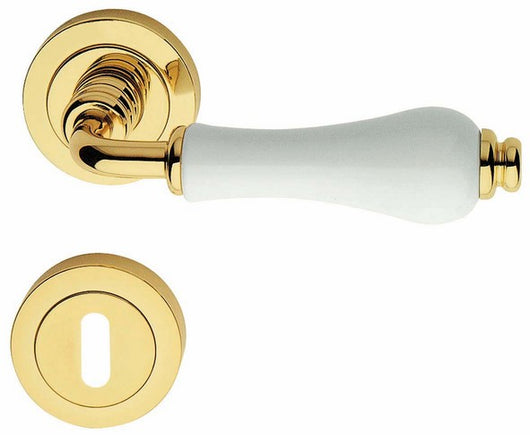 MANIGLIA OTTONE DALIA C/BOCCHETTA CERAM LUC BIA- 1,0 coppie