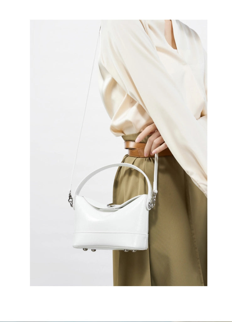 Borsa a mano e borsetta da donna in vera pelle, bianca.