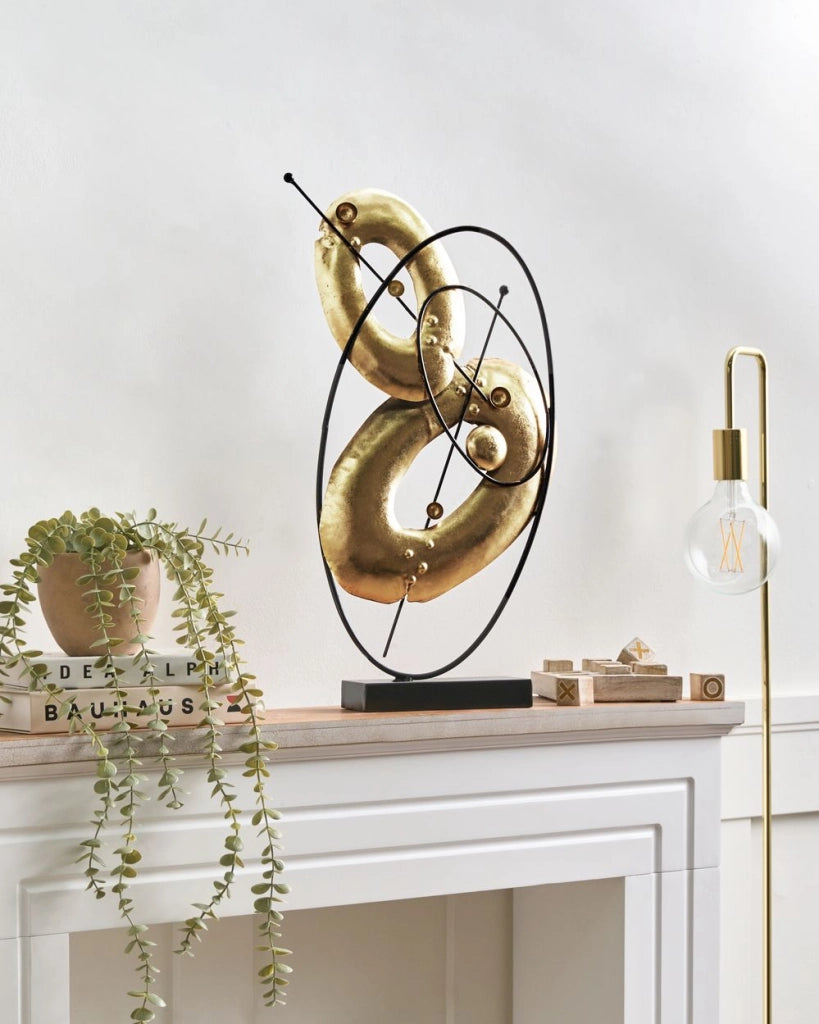 Decorazione per la casa Figurina decorativa in metallo dorato d'accento moderno Forma astratta Design glam