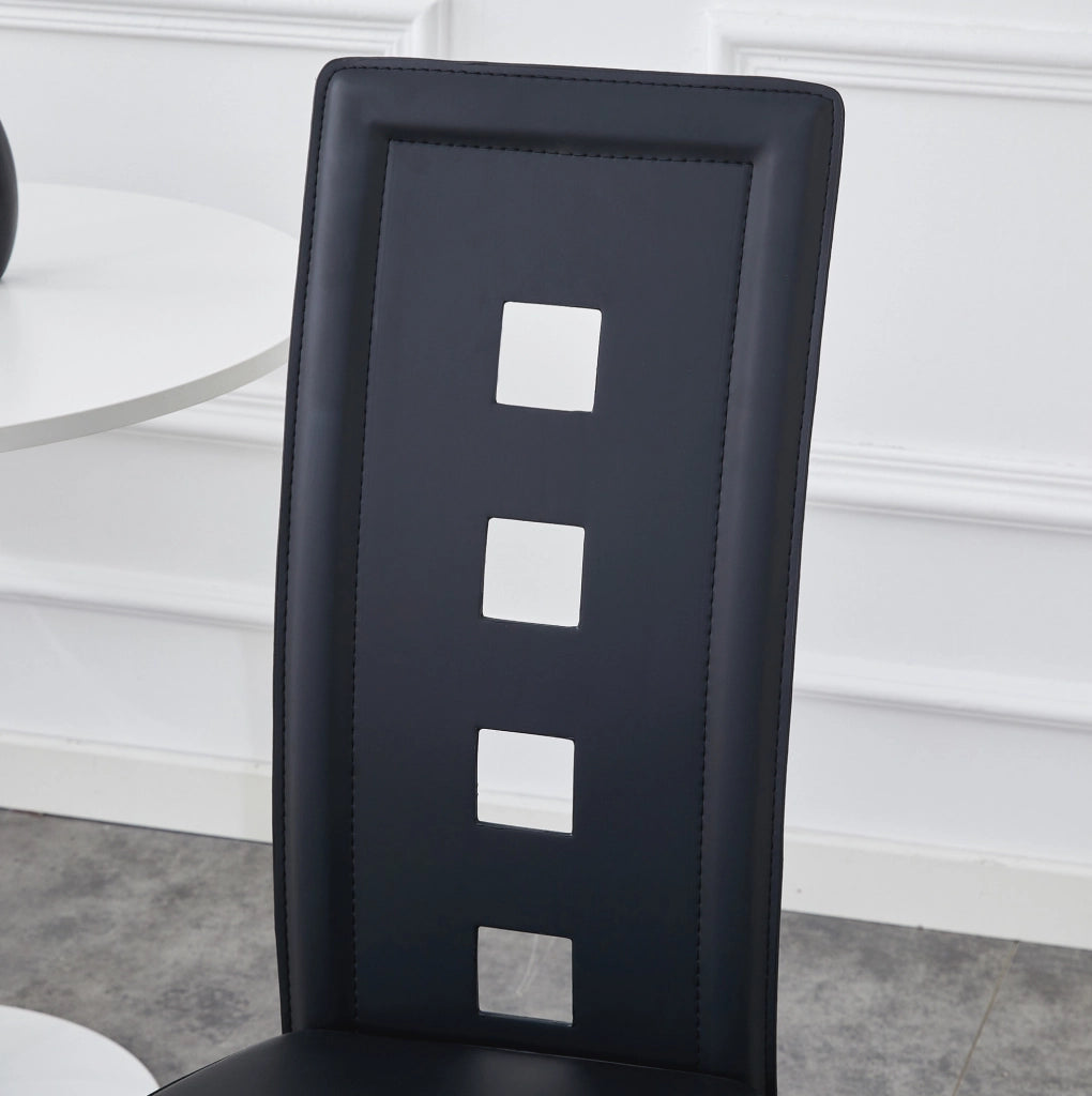 Set di 2 sedie da pranzo moderne con schienale traforato; H 102;5 cm; PU nero e metallo oro