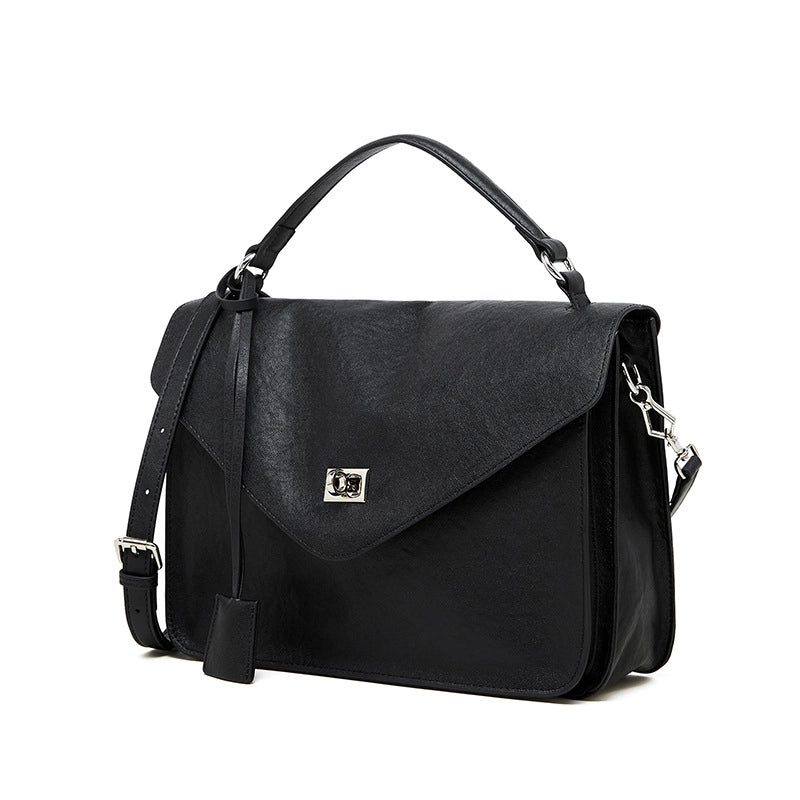 Borsa a mano media da donna in vera pelle, nera.
