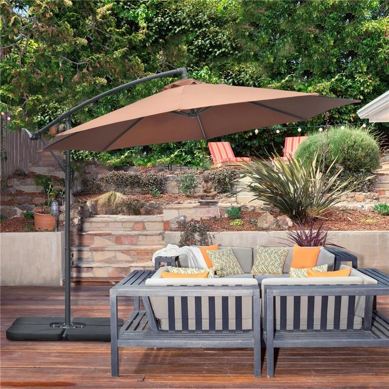 OMBRELLONE DECENTRATO A 6 STECCHE CON MANOVELLA E BASE A CROCE IN METALLO E POLIESTERE Ø 292X247 CM CAFFÈ