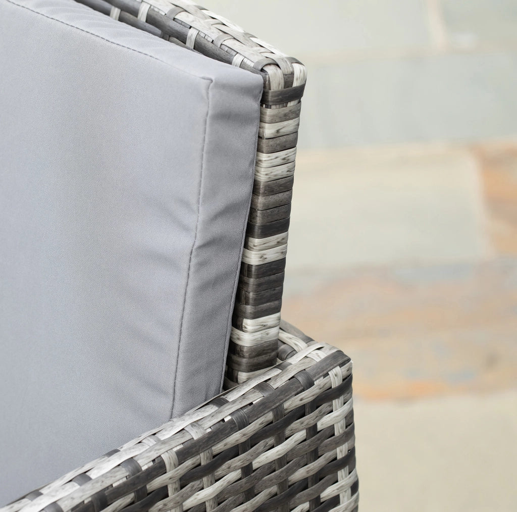 Salottino 5 pezzi in polyrattan grigio con cuscini e tavolo con piano in vetro